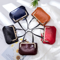 Porte-monnaie vintage fait main avec fermoir à pression et poignée, style mini sac à main, pochette à fermeture éclair pour monnaie, petit portefeuille portable pour femme