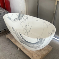 Baignoire autoportante en forme d'oeuf en marbre blanc de luxe Baignoire de trempage en pierre artificielle solide au design moderne pour hôtels