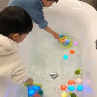 Jouet de bain pour bébé animaux mignons eau de natation jouets lumineux à LED en caoutchouc souple flotteur Induction grenouilles lumineuses tout-petits bain pour enfants