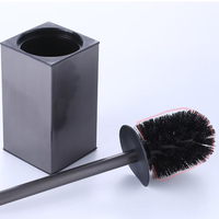 Brosse de toilette moderne et durable en acier inoxydable sur pied avec long manche et base en plastique pour le nettoyage de la salle de bain
