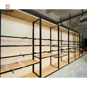 Modern Stainless Steel Clothing <b>Display</b> Racks | <b>Wall</b>-Mounted & Island Garment <b>Cabinets</b> | Custom Boutique Retail Fixtures - Product Image 2
