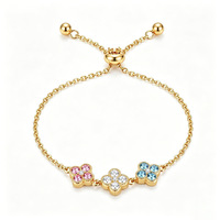 Nouveau bracelet de luxe haut de gamme incrusté de diamants, trèfle à quatre feuilles, pétales de fleurs, en acier inoxydable électroplaqué pour femme