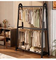 Porte-manteau mural de qualité supérieure pour la vente au détail, finition mate noire, construction en tube d'acier thermolaqué, support pour vêtements et objets décoratifs
