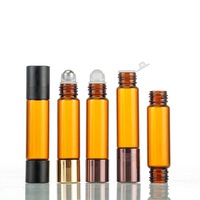 Flacon d'huile essentielle en verre ambré à double tête roll-on de qualité supérieure 10 ml avec diffuseur à bâtonnets et estampage doré pour emballage de parfum et cosmétiques
