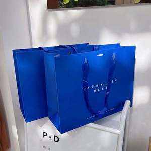 Sacs en papier de luxe pour cadeaux, sacs d'emballage pour vêtements, sacs de shopping européens, recyclables et biodégradables, avec votre propre logo pour les petites entreprises - Product Image 1