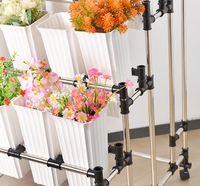 Étagère en fer multicouche Support de fleurs mobile à roulettes écologique pour intérieur/extérieur Salon Présentoirs sur pied