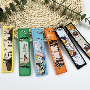 100 styles de porte-clés brodés <span class=keywords><strong>anime</strong></span> de haute qualité, porte-clés pour sac à dos, décoration de sac à dos - Product Image 3