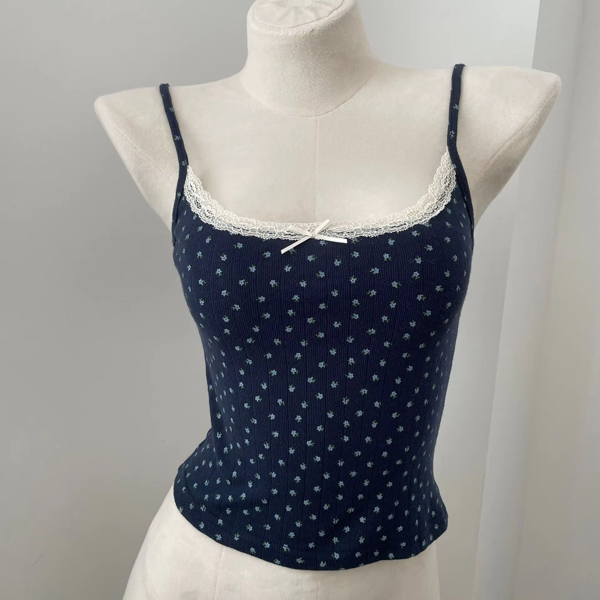 Navy blue bottom with blue flower--vest
