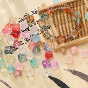 Cuentas de cristal coloridas con forma de león, forma irregular con agujeros rectos para hacer pulseras, cuentas dispersas de estilo chino - Product Image 1