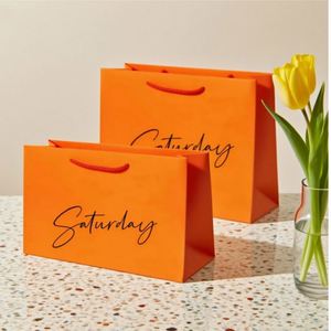 Sac en papier cadeau biodégradable personnalisé avec logo imprimé, bon marché, avec poignée, enveloppé dans un sac en papier kraft blanc - Product Image 2