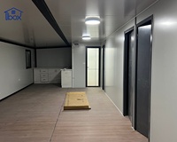 Maison préfabriquée noire de 56 m² à construction rapide, maison extensible de 30 pieds, maison conteneur pliable pour bureau, magasin, ou logement secondaire préfabriqué