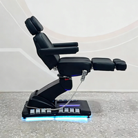 Meubles de salon de beauté modernes entièrement noirs, table de massage à 4 moteurs rotatifs, fauteuil de soin du visage électrique inclinable de luxe, lit de spa
