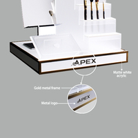Présentoir de magasin de cosmétiques de luxe APEX Eyeliner acrylique support de brosse de maquillage présentoir de maquillage de Table pour le magasin