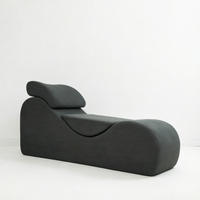 Chaise longue moderne noire côtelée et courbée avec oreiller appui-tête pour salon et chambre à coucher – Vente en gros, directement de l'usine