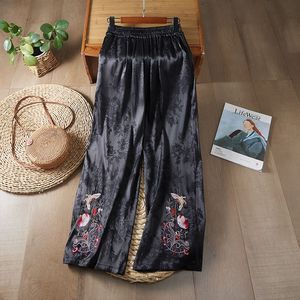 Traditional Chinese Embroidered Wide Leg Pants Black And White Loose Fit Casual Pants For Women With Floral Design - Product Image 2