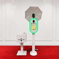 Machine Photobooth iPad surélevée avec colonne télescopique réglable et anneau lumineux LED pour événements, fêtes et photographie en studio
