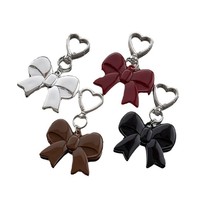 Porte-clés Cœur INS haut de gamme populaire Mengda, grand nœud pour couple, pendentif de sac pour femme