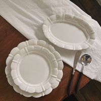 Assiette à dessert ovale en porcelaine rétro de luxe léger, sous glaçure, couleur unie, compatible micro-ondes, pour mariage et fêtes, haute valeur