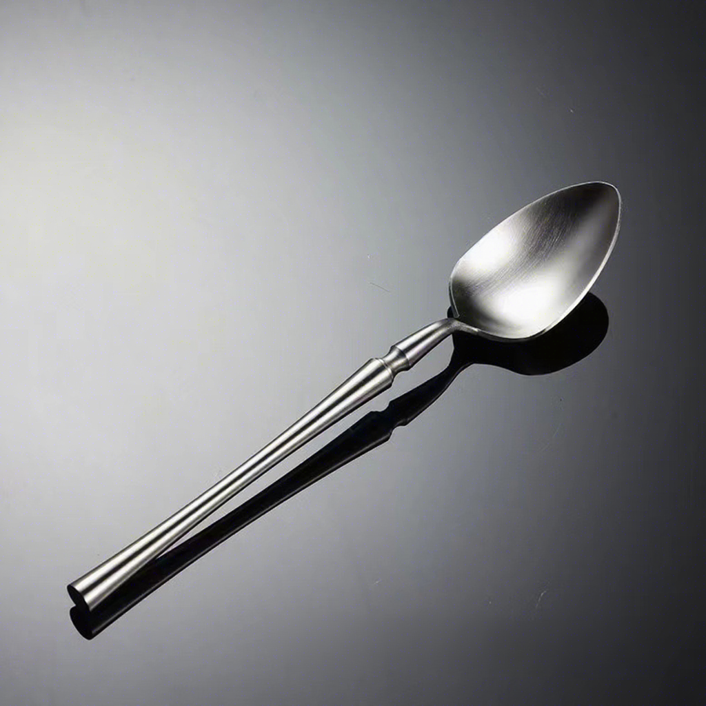 Cuchara de plata para cena