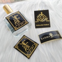 Modèle d'étiquette de produit bouteille parfum étiquette autocollant impression de logo transfert de logo personnalisé autocollants en métal de parfum de carte en relief