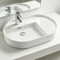 Encimera de baño de cerámica ovalada de buena calidad, lavabo de tocador, lavabo de gabinete de cara de mano moderno de gran tamaño para Hotel de lujo