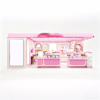 Kiosque pop-up rose pastel pour la beauté, stand de cosmétiques avec éclairage LED complet, présentoirs arqués, comptoirs modulaires, design imperméable