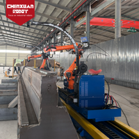 Cellule de soudage robotisée double sur rail partagé avec localisation de la couture par vision pour le soudage de composants structurels de grande taille