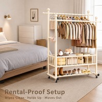 Porte-vêtements élégant en acier au carbone avec étagères en maille et roulettes pour salon, entrée, organisation quotidienne des vêtements à domicile