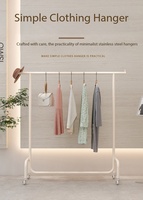 Présentoir à vêtements en acier inoxydable style crème, avec roulettes, vente directe usine, idéal pour les boutiques