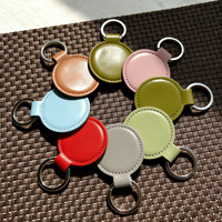 Porte-clés rond en cuir vierge sans logo pour la vente en gros et au détail, avec logo gravé au laser, porte-clés en cuir PU