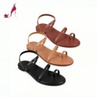 Sandales plates pour femmes à lanières fines et anneau d'orteil, bout ouvert, style minimaliste, avec amorti, pour soirée romantique, en similicuir souple PU, été