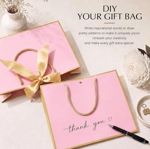 Sacs en papier blanc enduit écologiques réutilisables imprimés sur mesure avec poignée en papier pour l'emballage de cadeaux en gros - Product Image 3