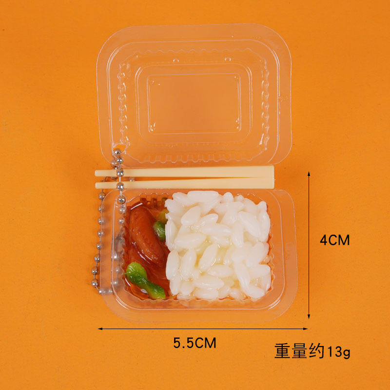 Riz aux ailes de poulet (100g)