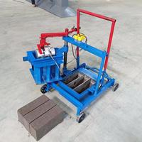 Machine à fabriquer des briques en blocs emboîtables avec moteur, ligne de production de béton manuelle du Shaanxi pour la construction