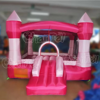 Château gonflable rose pour enfants avec toboggan