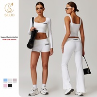 SILUO Ensemble de sport 2 pièces tendance : Haut court blanc à manches longues et col rond, pantalon évasé, survêtement de yoga rayé délavé