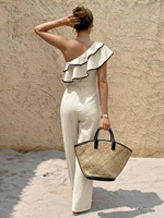 Combinaison asymétrique à volants et ceinture nouée, style vacances été 2026, avec empiècements color-block et bordure noire, personnalisable et en gros