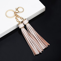 Porte-clés pendentif 3D couleur jaune avec pompon en cuir