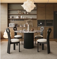 Table à manger en marbre de style crème moderne Plaque inférieure à support complet Conception ronde de haute qualité pour les petits ménages