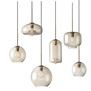 Lampade a Sospensione LED Nordiche Moderne Minimaliste E27 in Vetro Rotondo Color Cognac - Product Image 1