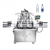 Machine de remplissage électrique automatique à quatre têtes haute vitesse pour bouteilles de boissons en verre de 200 ml (eau, lait, thé et jus)