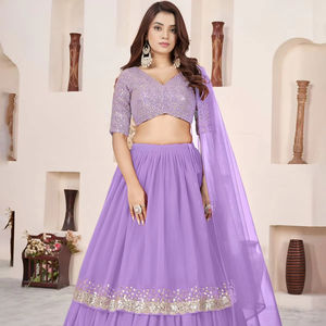 Lehenga violet moderne fluide en georgette douce avec bordure en dentelle richement ornée de sequins argentés, élégance royale et brillance pour les occasions de mariage - Product Image 1