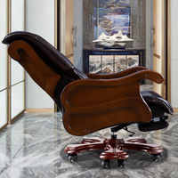 Chaise de bureau classique en cuir véritable ergonomique pour cadres avec repose-pieds
