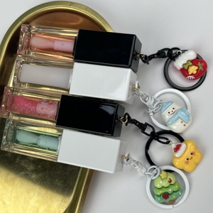 Aceite de labios navideño festivo vegano con colgante de llavero, brillo de labios líquido hidratante DIY para maquillaje de vacaciones, efecto de cambio de Color - Product Image 1