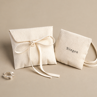 Pochette à bijoux en toile de coton, sac cadeau enveloppe avec nœud en ruban, logo personnalisé pour l'emballage de bagues et colliers, vente en gros