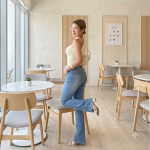 Pantalones vaqueros azul claro para mujer, estilo vintage, de pierna ancha, ajuste ceñido, transpirables, para verano, con diseño de fábrica y orificio en la cintura - Product Image 1