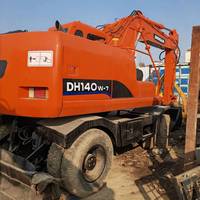 Offre Spéciale : Excavatrice sur pneus d'occasion Doosan DH140w-7/DH150-7 de 14 tonnes, moteur EPA CE, godet de 0,8 m, puissance de 98,4 kW, attache rapide, pour travaux routiers