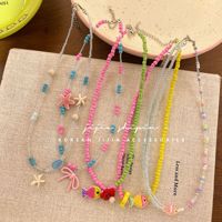 Kalung akrilik kustom dengan manik-manik berwarna kartun. Penyangga telepon. Cocok untuk anak perempuan.
