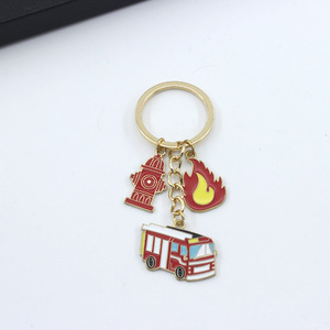 Lot de porte-clés à thème <span class=keywords><strong>pompier</strong></span> : <span class=keywords><strong>camion</strong></span> de pompiers, hydrant, combinaison de <span class=keywords><strong>pompier</strong></span>, extincteur – Promotion sécurité incendie - Product Image 3