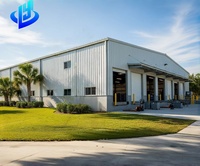 Bâtiment à structure en acier, design moderne, résistance au vent de 121+ mph - Fabrication standard d'exportation pour projets de fabrication mondiaux